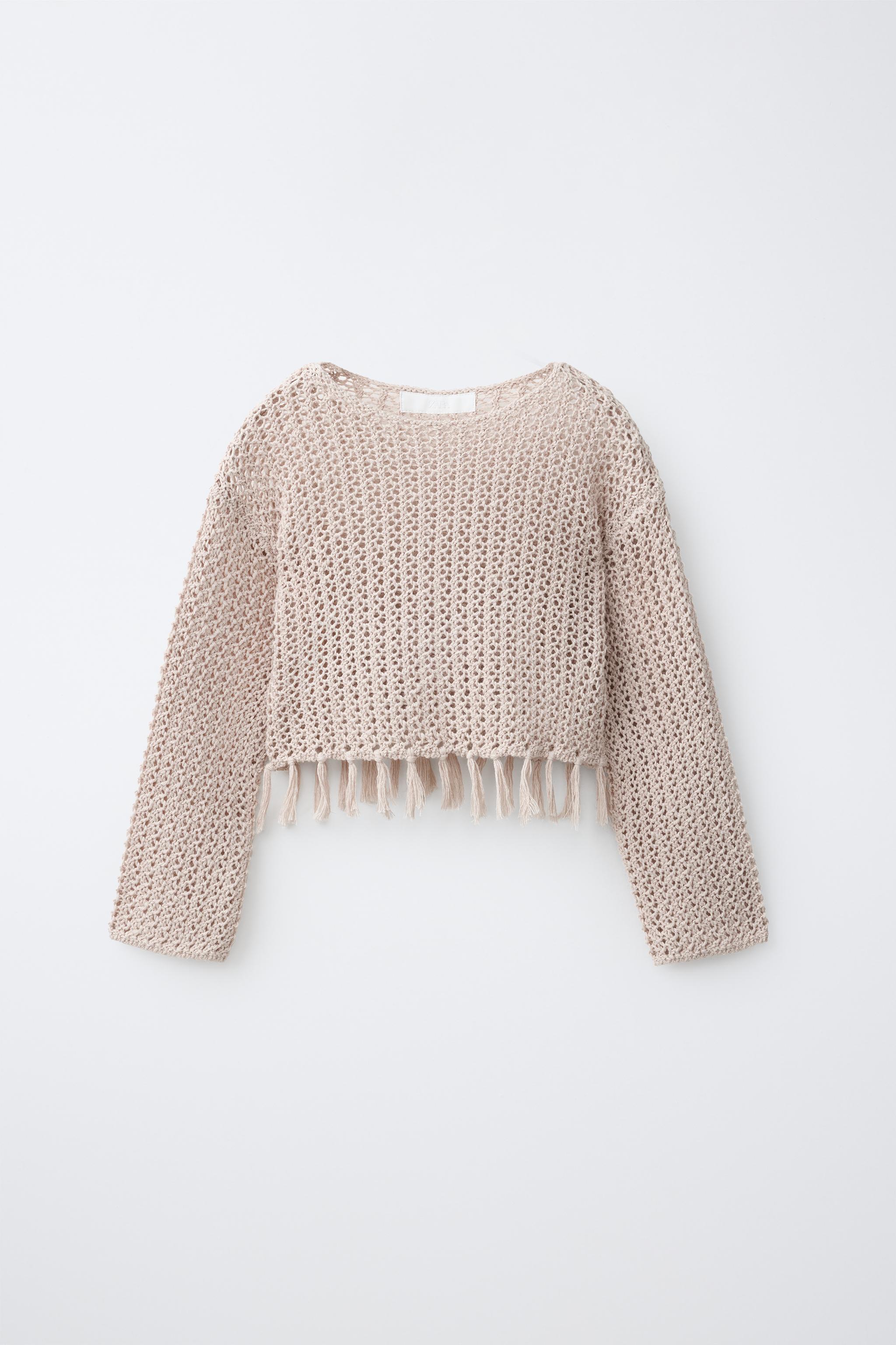 PULL EN MAILLE À FRANGES